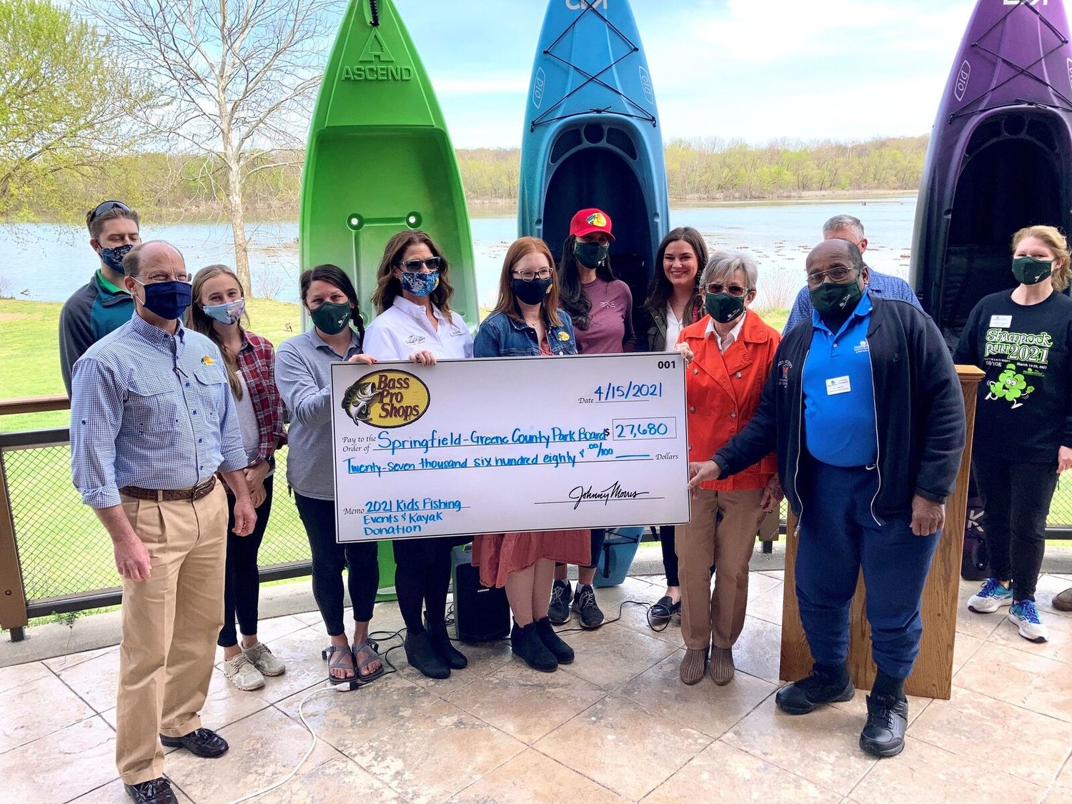 OUTDOOR GIVINGBass Pro Shops on April 15 presents a ceremonial $27,680 check to the Springfield-Greene County Park Board. The donation amount represents the cost of 40 new kayaks, paddles and life jackets given to the Park Board for use at Lake Springfield Park. The gear also will be used by the Park Board’s Outdoor Initiatives program for guiding paddling programs at area rivers and streams.